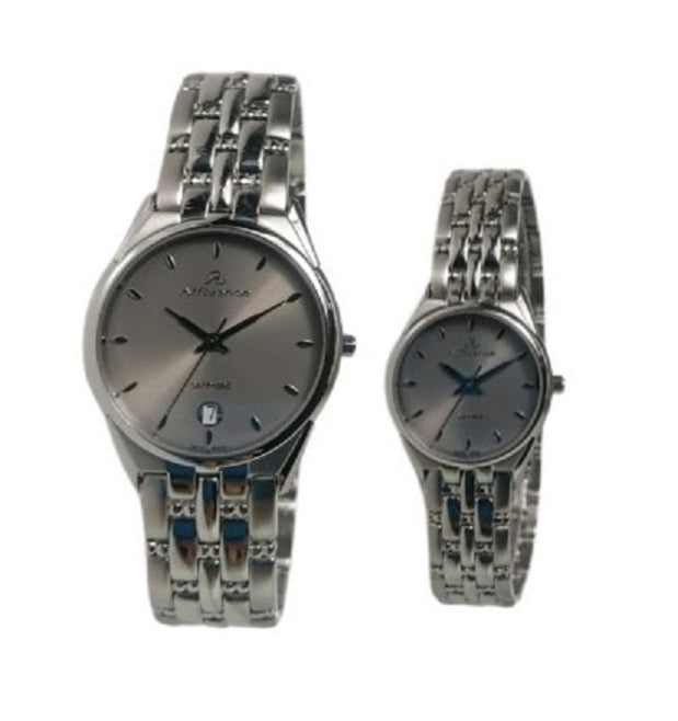Two silver watches with intricate links on a white background