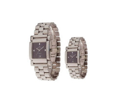 Two silver wristwatches with rectangular faces on a white background